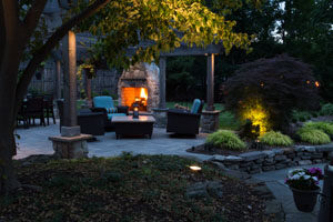 Outdoor Living and Dining Space with Fireplace Wyckoff