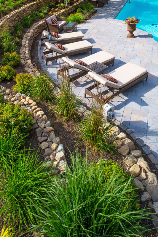 rock retaining wall and landscape construction by Horizon Landscape